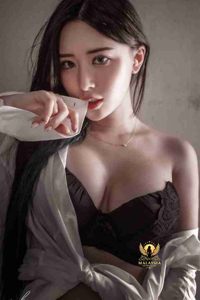 Malaysia Escort Girl Chinese Escort KL Jia Ying, a stunning woman with long dark hair, wearing lingerie. Sex Service Kuala Lumpur