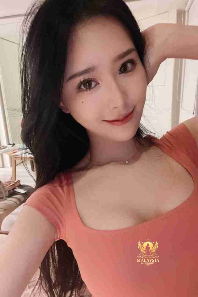 Malaysia Escort Girl Chinese Escort KL Jia Ying, a stunning woman with long dark hair, wearing lingerie. Sex Service Kuala Lumpur